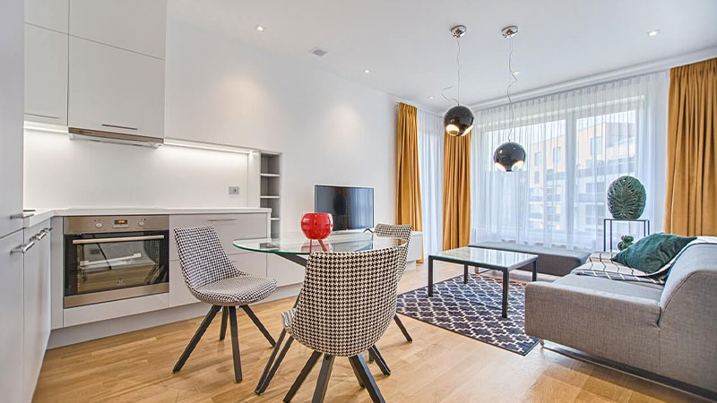 Two Chairs With Glass Table On Living Room 1